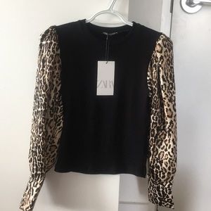 Contrasting top. Black/Leopard.
